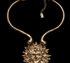 Yves Saint Laurent (circa 1980s), United States: Face torque necklace. Gold plated. Signed YSL. © Pablo Esteva