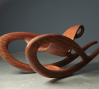 Wendell Castle: Ghost Rider, 2010, Bubinga wood with oil finish 29 1/4 x 32 x 76 1/2 in. (74.3 x 81.3 x 194.3 cm) Courtesy of the artist; Friedman Benda, New York, Photo: Jon Lam Photography