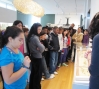Students view an exhibit piece 