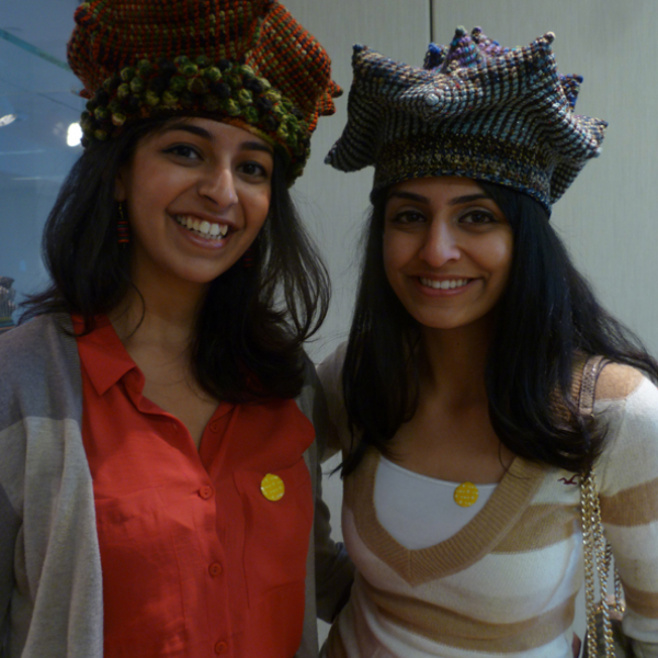 Visitors in the Open Studios wearing Bailey's crowns.