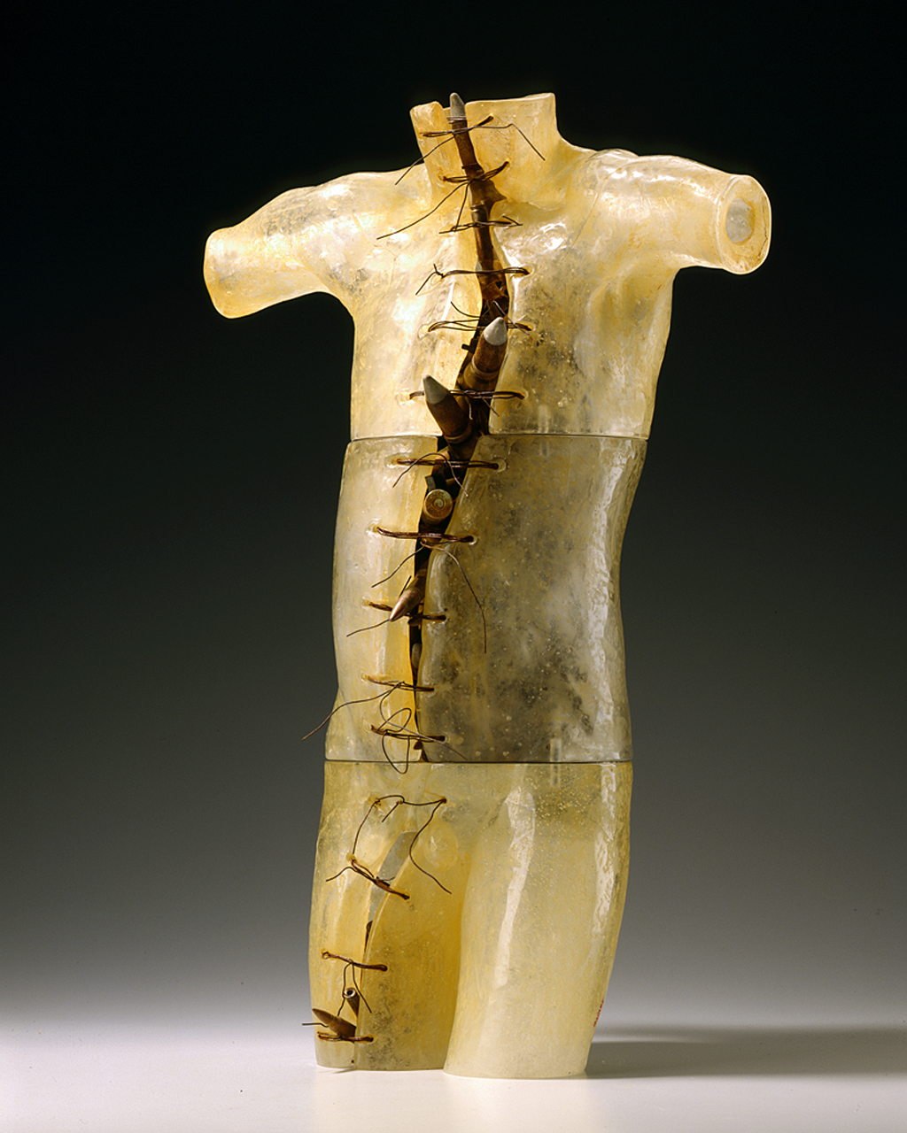 War Boy - Job No. 1, 2006: Clifford Rainey. Glass, inert ammunition, iron wire, oxides, pins, maple plinth. Photo: Lee Fatherree