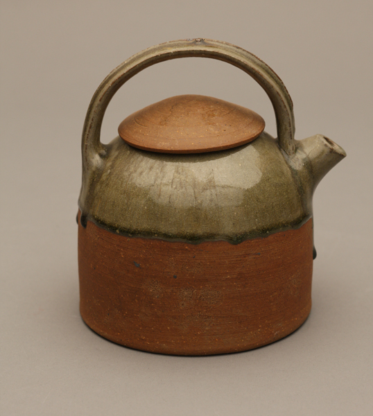 Byron Temple; Teapot, 1967: Glazed clay; wheel thrown, hand built 7 x 6 1/4 x 5 1/2 in. (17.8 x 15.9 x 14 cm) Museum of Arts and Design, Museum purchase with funds provided by Frank E. Heaston and Dr. Robert C. Reynolds, through the American Craft Council, 1967, 1971.2 a,b  Photo Credit: Ed Watkins