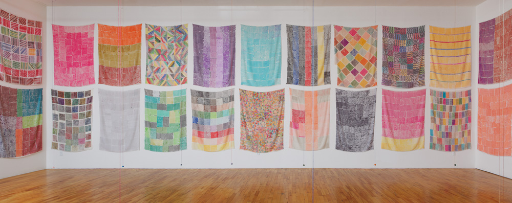 Polly Apfelbaum: Handweavers Pattern Book installation, 2014<br> 30 textiles: marker on rayon silk velvet<br> 10 ceramic beads on embroidery thread<br> Courtesy of the artist and Clifton Benevento<br> Photo by Andres Ramirez  