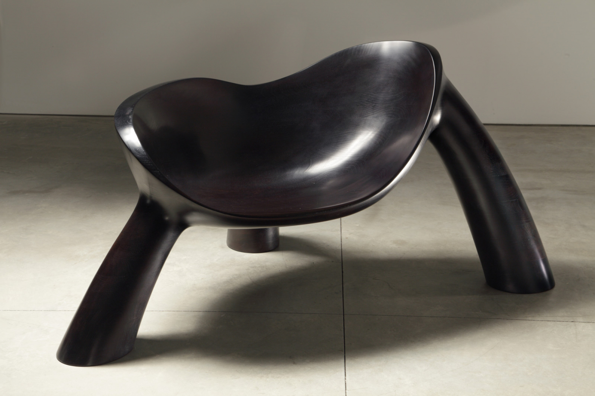 Long Night, 2011: Peruvian walnut<br> 66 3/4 x 38 1/4 x 32 in. (169.5 x 97.2 x 81.3 cm)<br> Courtesy of the artist and Friedman Benda, New York, NY<br> Photo courtesy of Friedman Benda and the artist; Photo by Jon Lam Photography     