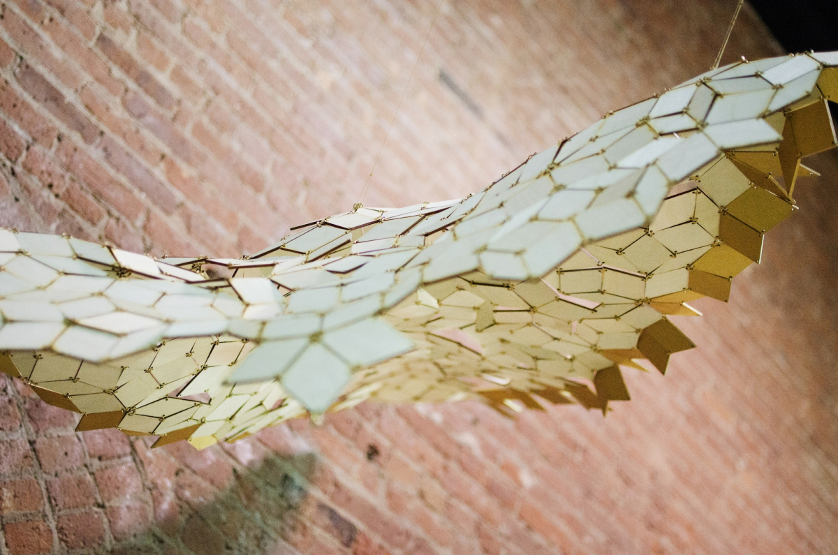 Floating Penrose Rhombuses, 2014: Plywood, Brass; Photo: Talya Stein